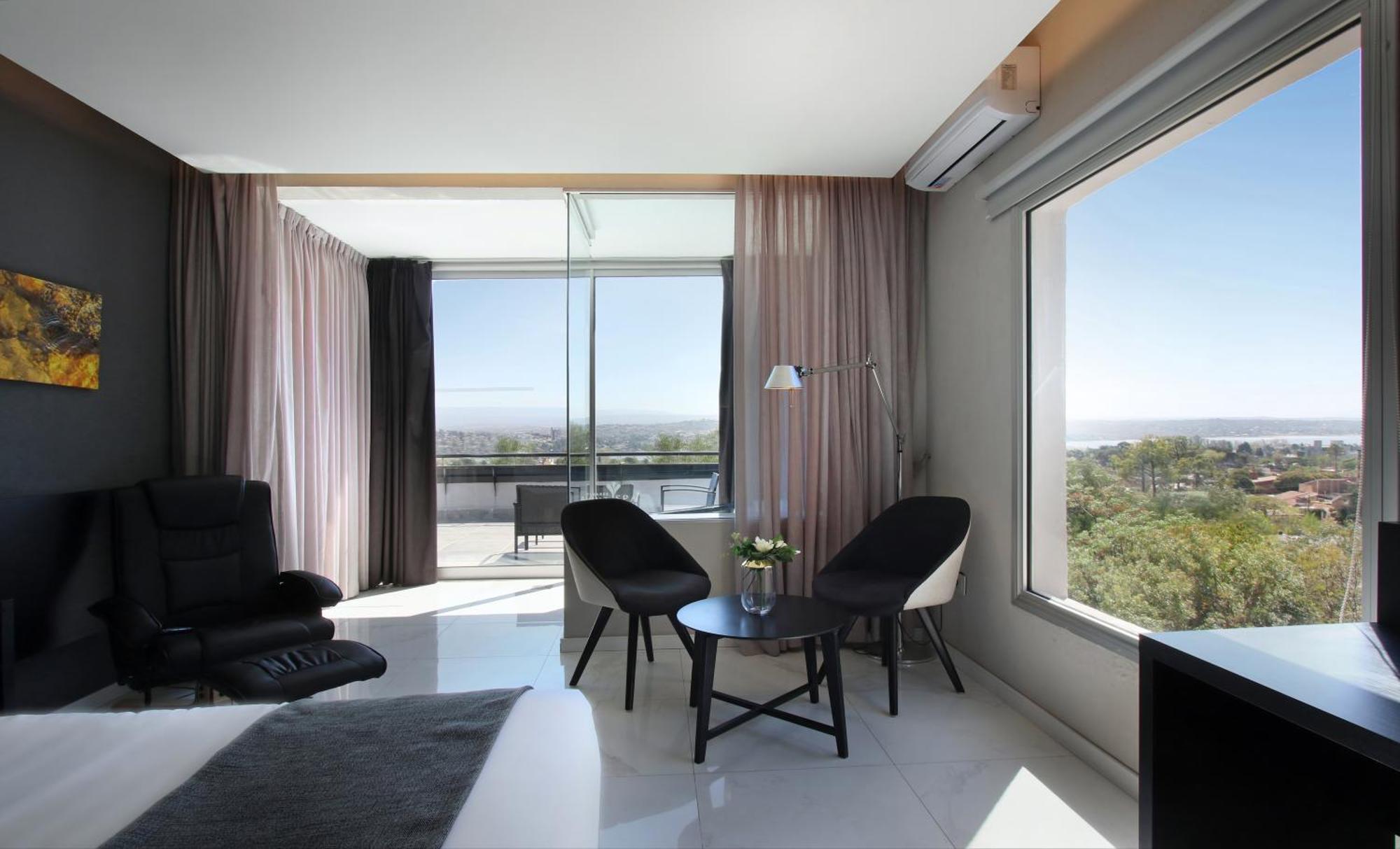 Pinares Panorama Suites, Spa & Convention Center Villa Carlos Paz Exterior photo